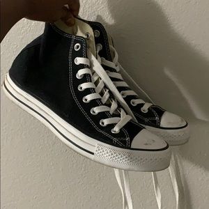 Black and white high top converse